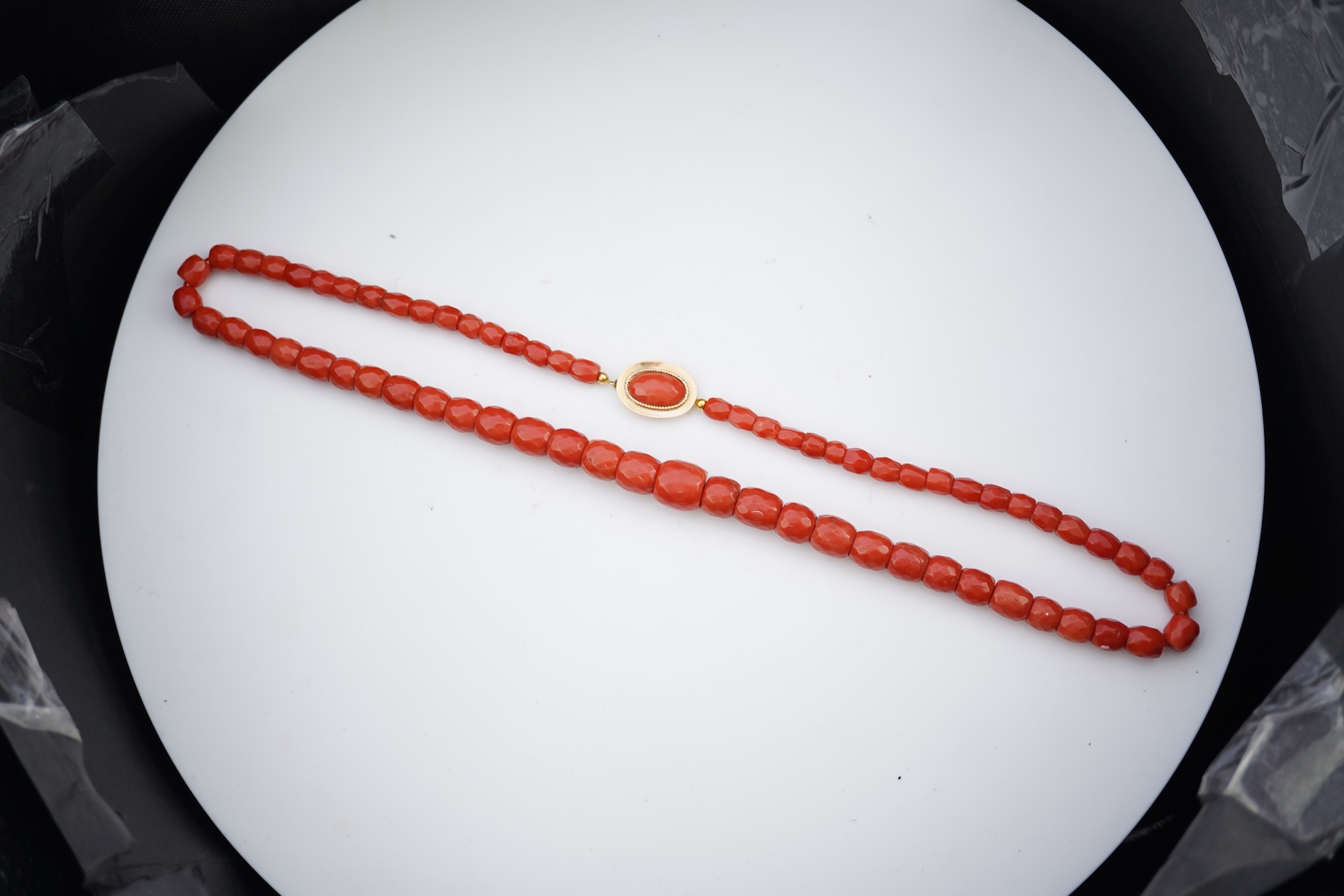 A coral bead necklace, mid 19th century
